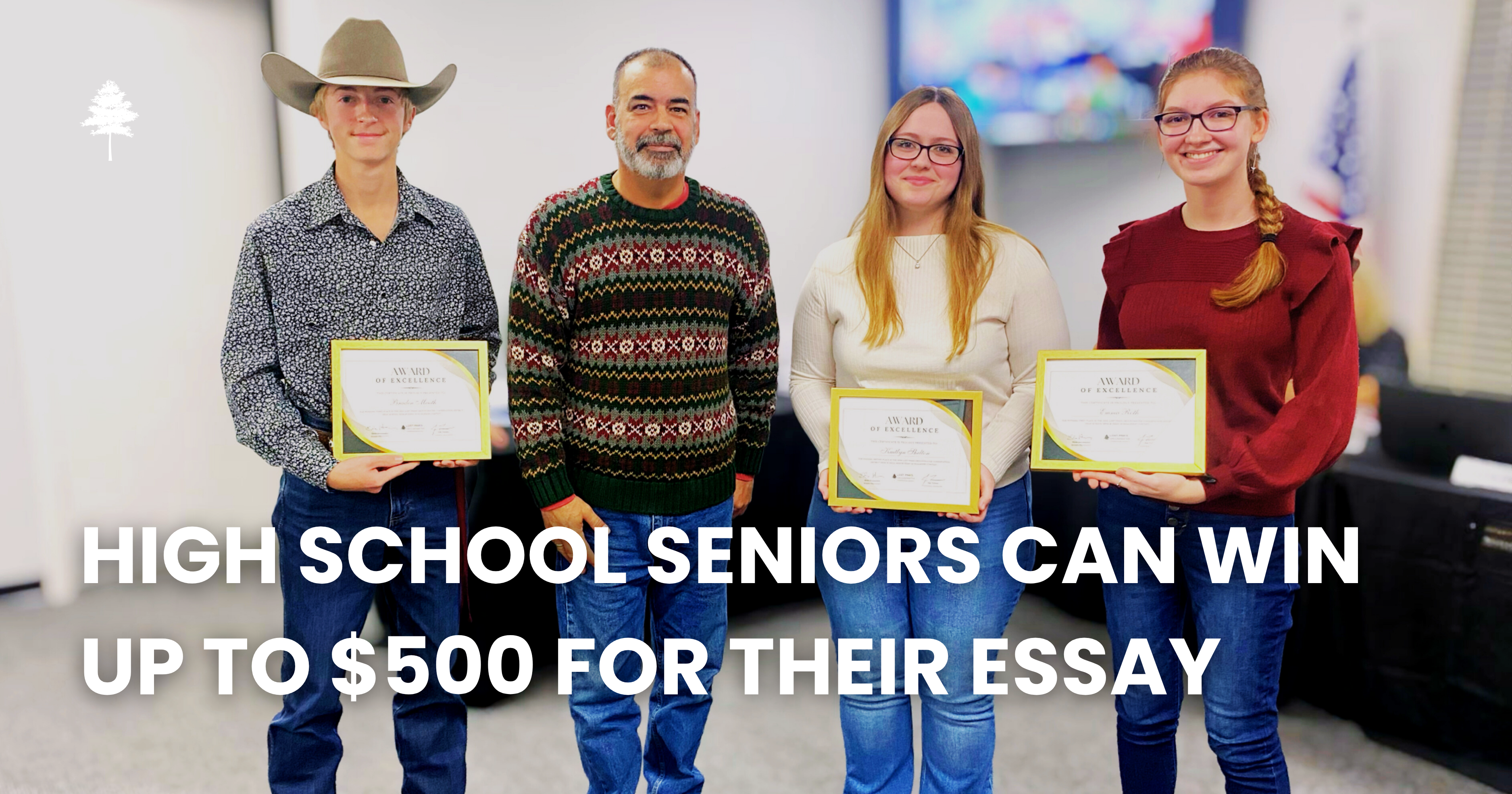 Image showing three high school seniors posing with awards